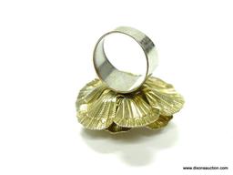 VINTAGE FLOWER SHAPED CONVERSATION RING SIZE 5.5. FLOWER 1.25" ACROSS. HAS A FAUX PEARL IN THE