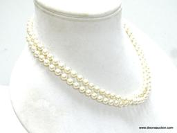 G SILVER MARKED CLASP PEARL NECKLACE INDIVIDUALLY HAND KNOTTED. 36" LONG. IN VERY GOOD CONDITION.