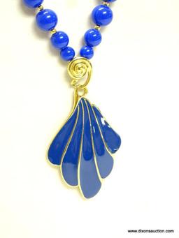 VINTAGE SIGNED TRIFARI BLUE AND GOLD TONE DROP PENDANT BEAD NECKLACE. 27" LONG. DROP PENDANT 3.25"