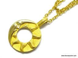 VERY NICE GOLD TONE CRESCENT MOON FACE AND SUN DOUBLE SIDED PENDANT NECKLACE. 36" LONG. PENDANT