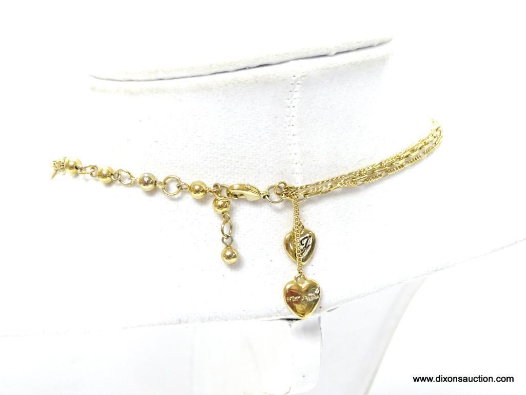 VERY COLLECTIBLE SIGNED BETSY JOHNSON DESIGNER HEART GOLD TONE NECKLACE. FEATURES 3 DIFFERENT GOLD