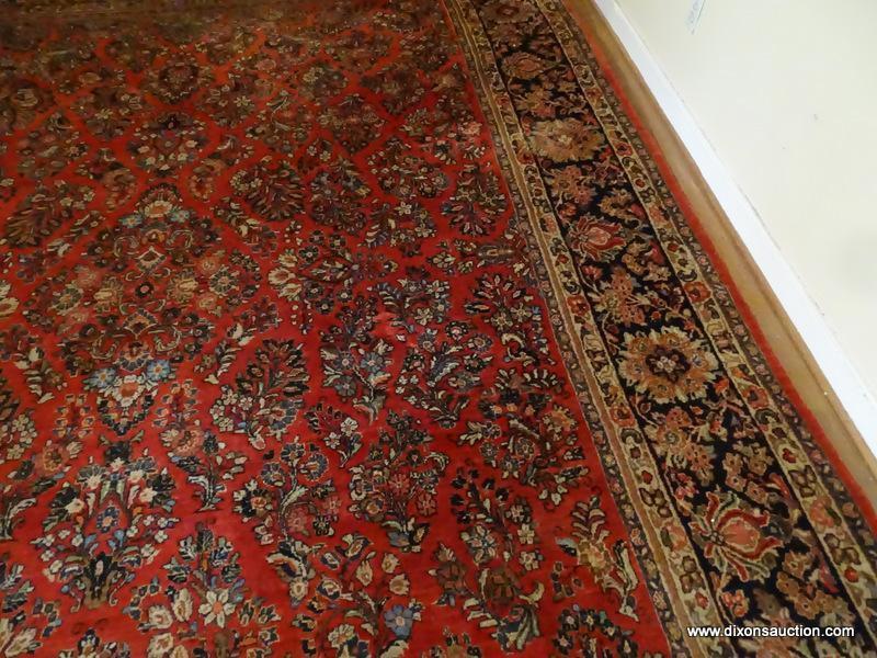 (LR) LARGE ROOM SIZE ORIENTAL RUG. HANDMADE. APPROX. 10FT 10 IN BY 13FT 4IN. GOOD USED CONDITION.