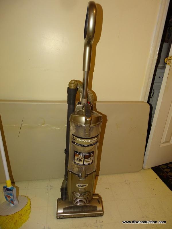 (L) CONTENTS OF THE LAUNDRY ROOM. DOES NOT INCLUDE WASHER, DRYER, HOT WATER HEATER, OR SHELVING.