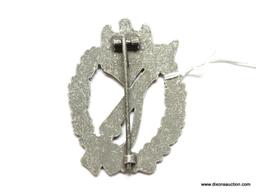 German World War II Army Silver Infantry Assault Badge. The reverse side is maker marked "SHuCo 41".