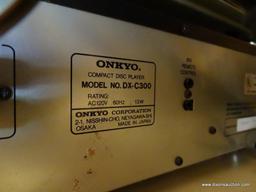 (FR) ONKYO 6 DISC COMPACT DISC PLAYER. MODEL DX-C300.