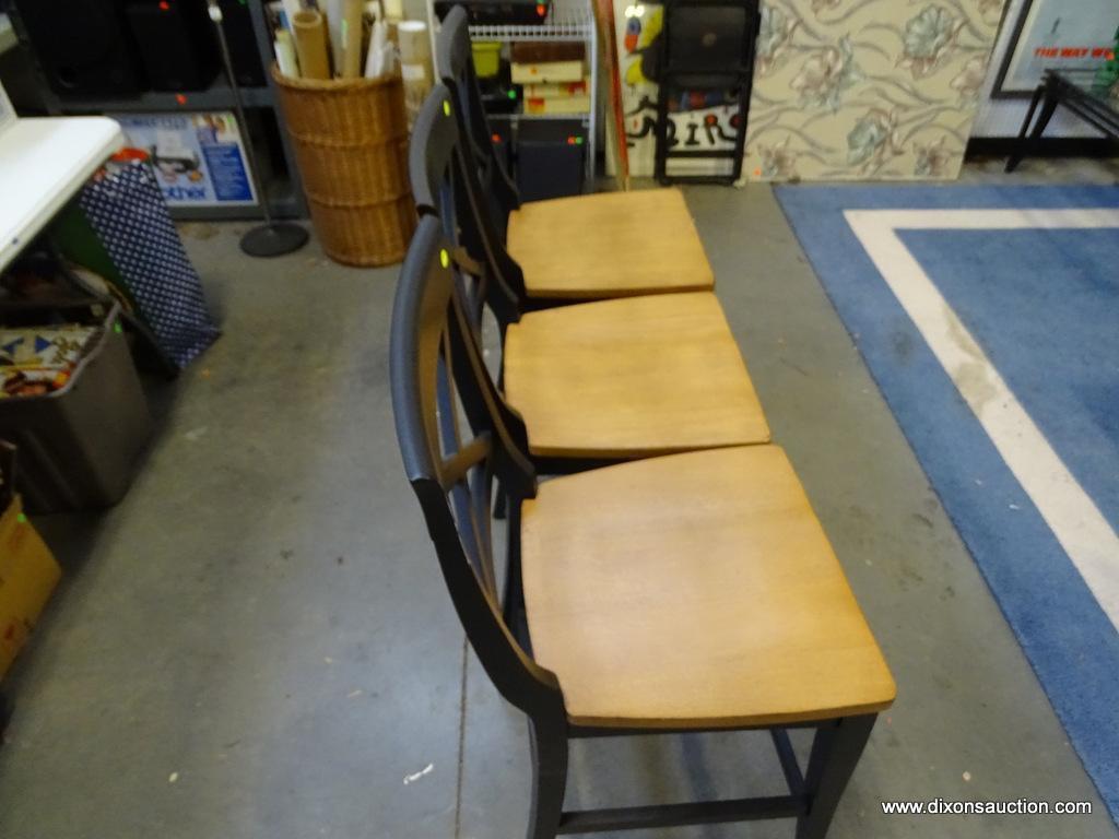 (ROW 1) MAPLE TOP AND PAINTED BLACK BASE BAR TABLE AND 3 CHAIRS. TABLE: 48"x36". 3 MATCHING BAR