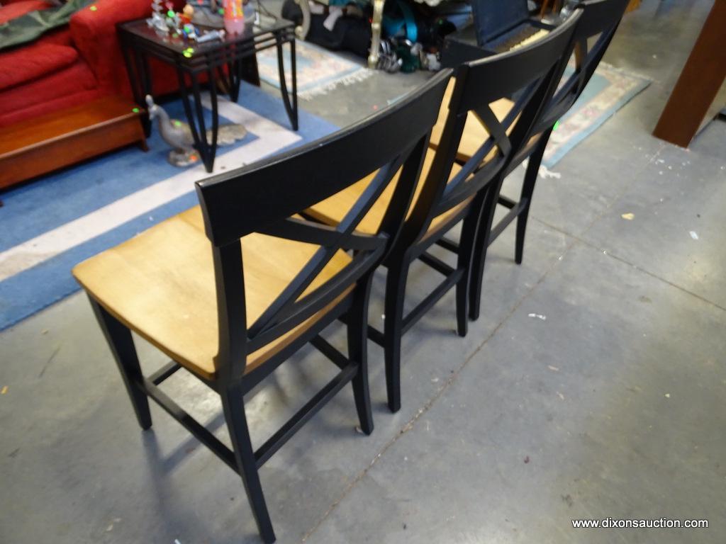 (ROW 1) MAPLE TOP AND PAINTED BLACK BASE BAR TABLE AND 3 CHAIRS. TABLE: 48"x36". 3 MATCHING BAR
