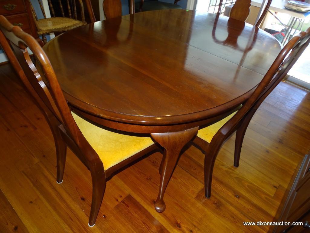 (DR) MAHOGANY QUEEN ANNE DINING ROOM TABLE WITH 2 LEAVES AND 6 CHAIRS. LEAVES ARE 12" WIDE EACH.