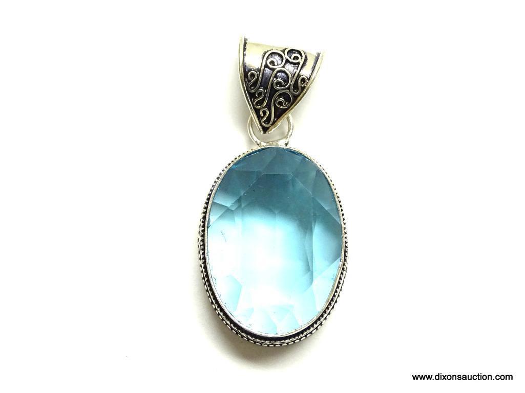 .925 STERLING SILVER 2'' LARGE FACETED BLUE TOPAZ PENDANT (RETAIL $79.00)