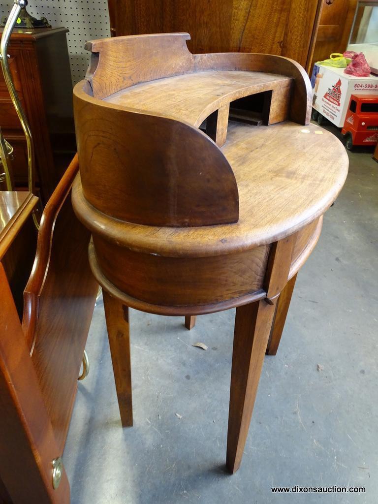 (A1) OVAL WALNUT 1 DRAWER TABLE WITH ELEVATED GALLERY. 28X19X34.5