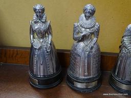 (A1) METAL COMMEMORATIVE STATUES OF ROYALTY (QUEENS). EACH IS A BELL ON A WOODEN BASE. ALL ARE