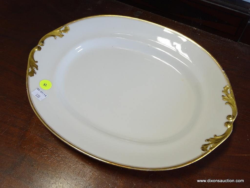 (A1) LIMOGES VINTAGE OVAL PLATTER WITH RIM CHIP. 13.5'' LONG