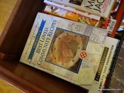 (LR) BOOK LOT IN LEFT HAND TRUNDLE DRAWER. INCLUDES SOME NICE COOK BOOKS. MOST ARE HARD BACK AND IN