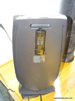 (FR) LASKO MOTION HEAT PLUS DIGITAL CERAMIC HEATER WITH REMOTE. IN GOOD WORKING CONDITION. 24''