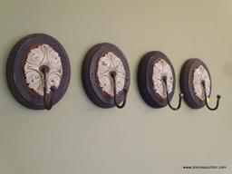 (LR) 4 BEAUTIFUL DECORATIVE WALL HOOKS. WOULD BE GREAT FOR ANY FOYER!