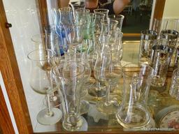 (DR) CONTENTS OF 1ST SHELF OF CHINA CABINET: RED WINE STEMS. CRYSTAL HIGHBALL GLASSES. WHITE WINE