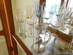(DR) CONTENTS OF 1ST SHELF OF CHINA CABINET: RED WINE STEMS. CRYSTAL HIGHBALL GLASSES. WHITE WINE