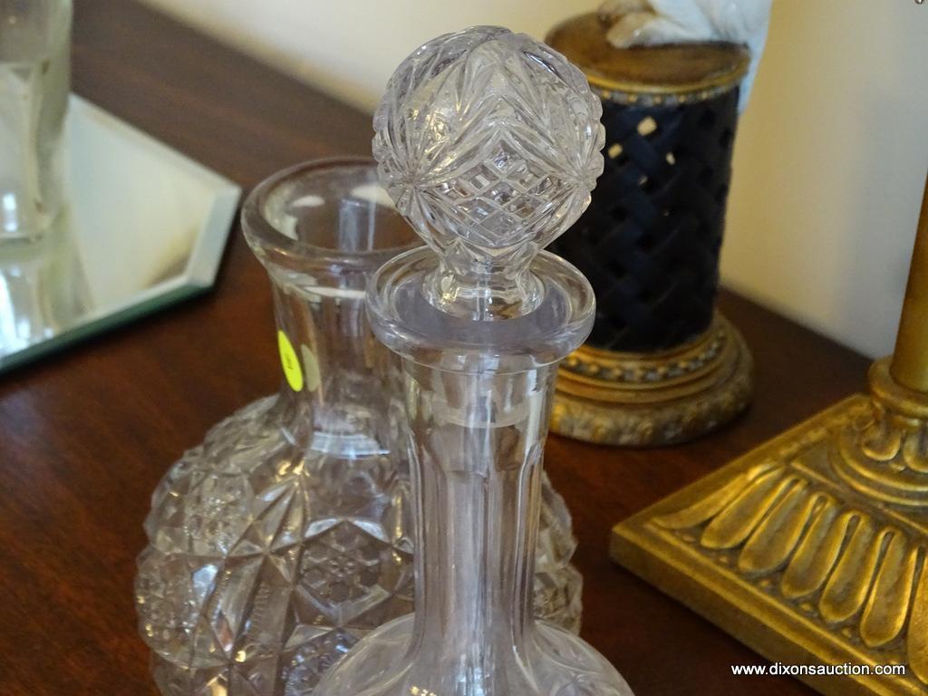 (DR) 2 DECANTERS (1 WITH STOPPER): 1 PRESSED GLASS WITH STAR PATTERN AND 1 IMPERIAL GLASS DECANTER