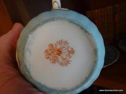 (DR) SHELF LOT: H.S. AUSTRIA 2 HANDLED PORTRAIT TEA CUP WITH SAUCER. EGG SHAPED SALT AND PEPPER