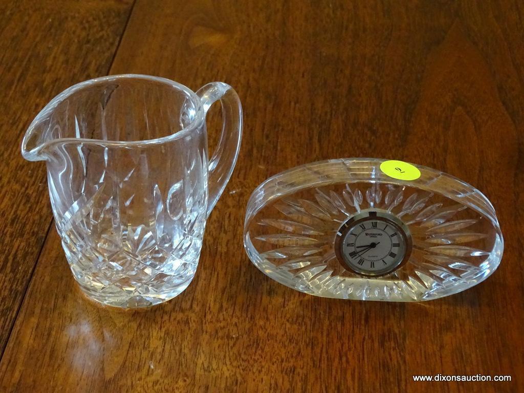 (DR) 2 PIECES OF SIGNED WATERFORD CRYSTAL: 1 CRYSTAL CREAMER AND 1 QUARTZ WATERFORD CLOCK ENCASED IN