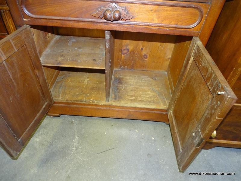 (ROW 2) VICTORIAN MARBLE TOP WASHSTAND WITH 1 DRAWER OVER 2 DOORS (DRAWER HAS A CARVED HANDLE).