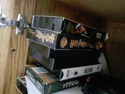 (LR CAB L) LOT OF ASSORTED VHS TAPES, CASSETTE TAPES, COMPACT DISCS, AND DVD'S, POPULAR TITLES OF