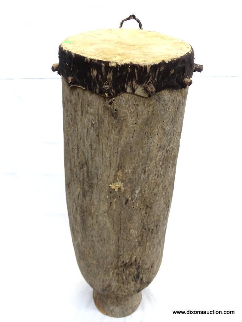 DRUM, MISIMBO TALL POLE DRUM CIRCULAR HOLLOWED OUT HARD WOOD IMPALED WITH ANIMAL SKIN USING PEGS