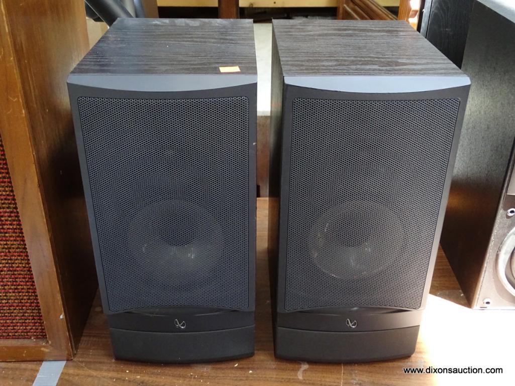 (R1) PAIR OF INFINITY SPEAKERS. MODEL RS3. IN BLACK WOOD GRAINED CASES. ONE IS MISSING THE PLASTIC