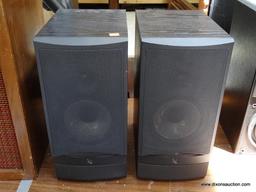 (R1) PAIR OF INFINITY SPEAKERS. MODEL RS3. IN BLACK WOOD GRAINED CASES. ONE IS MISSING THE PLASTIC