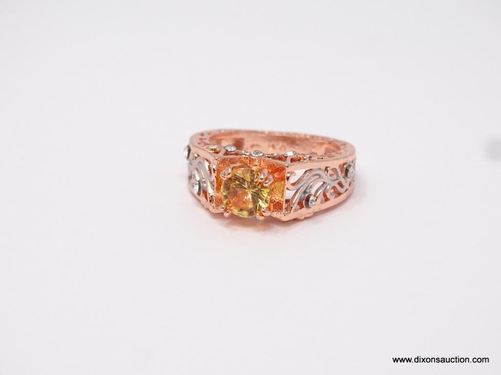 .925 STERLING LADIES RING WITH 2CT ORANGE GEMSTONE, SIZE 8.5.