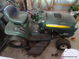 (SHED 1) CRAFTSMAN LT1000 HEAVY DUTY RIDING LAWN MOWER. MODEL 917.272761. HAS BAGGER ATTACHMENT