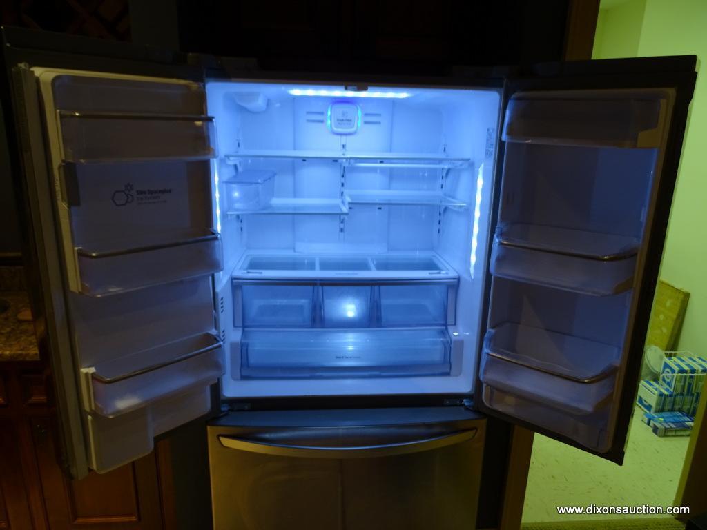 (B) LG FRENCH DOOR REFRIGERATOR; MODEL# LFX25991ST/05, MFGD 07/2013, COMPLETE WITH OWNER'S MANUAL