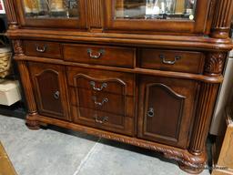 BWALL- BRAND NEW MAHOGANY FINISH 2 DOOR CHINA CABINET. THIS PIECE STILL HAS THE RETAIL PRICE TAG ON