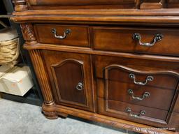 BWALL- BRAND NEW MAHOGANY FINISH 2 DOOR CHINA CABINET. THIS PIECE STILL HAS THE RETAIL PRICE TAG ON