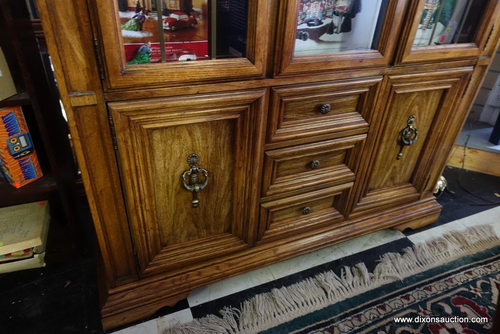 (R1) OAK CHINA CABINET BY STANLEY FURNITURE; THIS "FRUITWOOD" PIECE IS IN A COUNTRY FRENCH STYLE