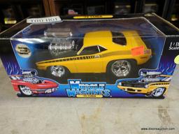 (SR1) MUSCLE MACHINES 1:18 SCALE 1970 CUDA. IN THE ORIGINAL PACKAGE