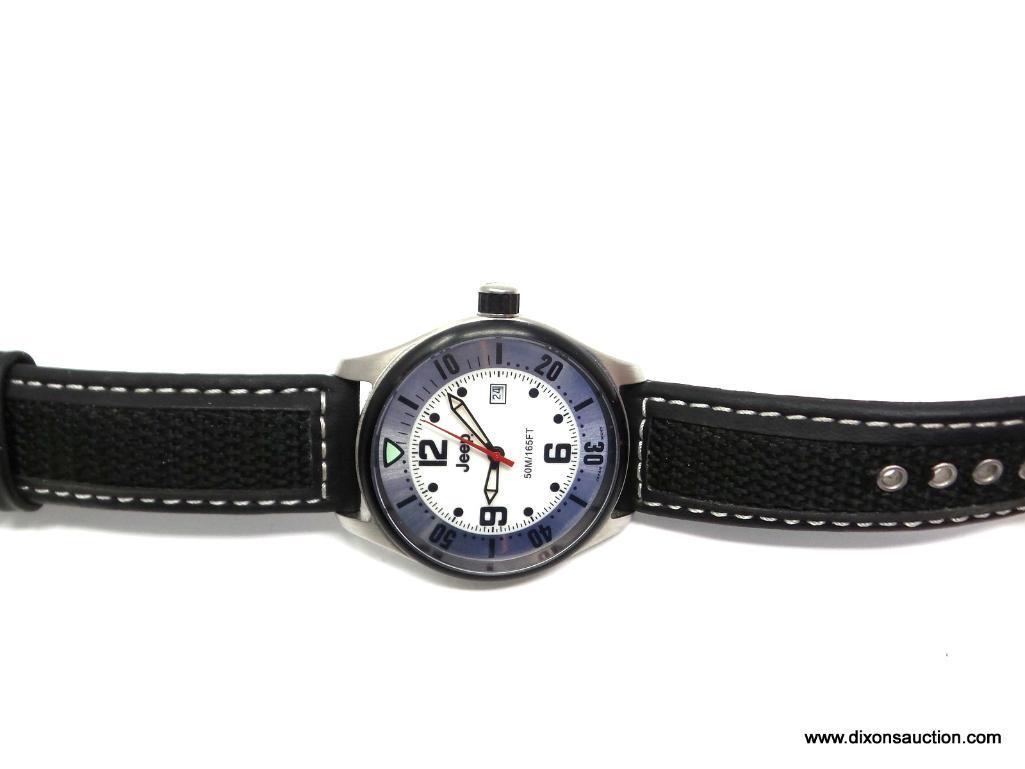 JEEP BRAND MEN'S WRIST WATCH. THIS IS A SHARP-LOOKING WATCH, MODEL # 4011. WATER RESISTANT TO 165