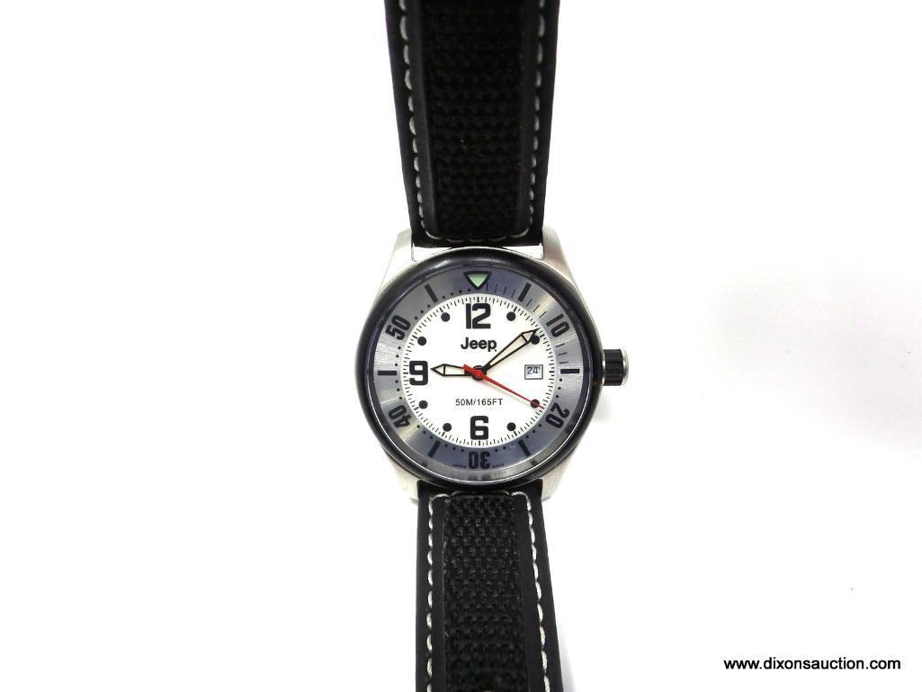 JEEP BRAND MEN'S WRIST WATCH. THIS IS A SHARP-LOOKING WATCH, MODEL # 4011. WATER RESISTANT TO 165