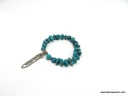 QUALITY STERLING SILVER AND TURQUOISE NUGGET BRACELET WITH SILVER SPACER BEADS IN BETWEEN THE