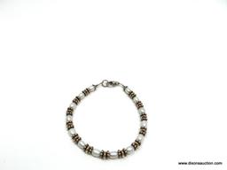 PEARL BRACELET WITH STERLING SILVER AND 10 KARAT GOLD. MEASURES 7 INCHES LONG. VERY GOOD ESTATE