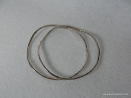 PAIR OF JAMES AVERY BANGLE BRACELETS. MARKED AVERY .925