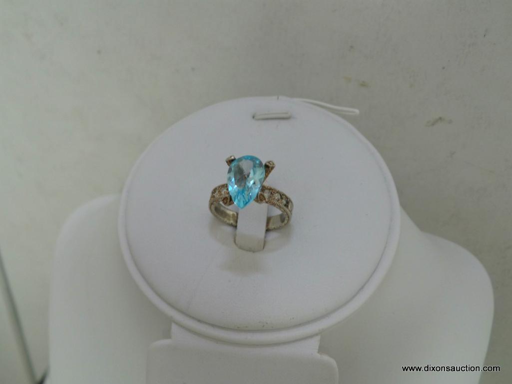 .925 RING WITH BLUE STONE, SIZE 8