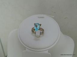 .925 RING WITH BLUE STONE, SIZE 8