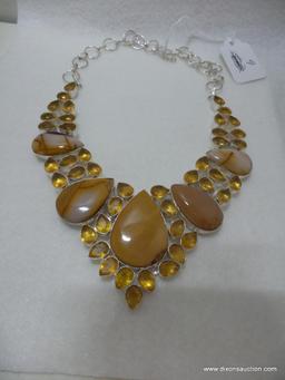 .925 STONE NECKLACE, WEIGHS 112 GRAMS TOTAL.