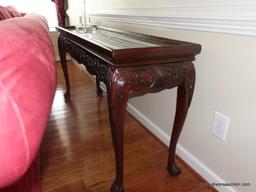 (LR) MAHOGANY AND GLASS TOP BALL AND CLAW FOOTED CONSOLE/SOFA TABLE WITH CARVED CORNERS: 54" X 17" X