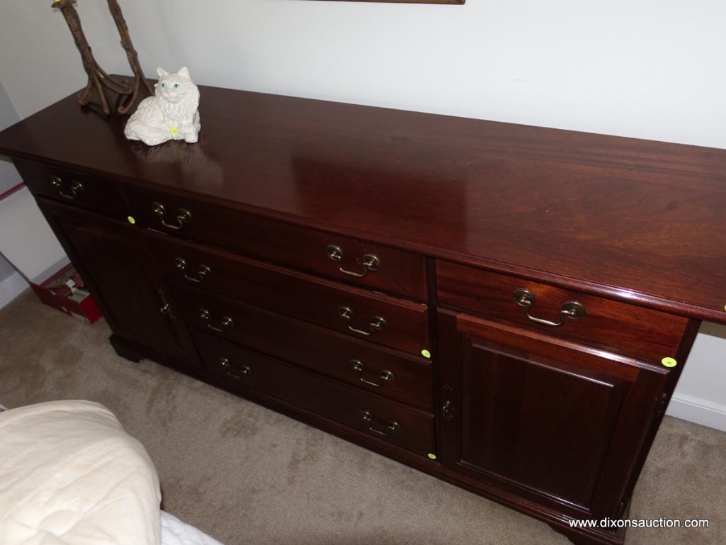 (BR2) VERY NICE QUALITY SIDEBOARD WITH 1 DRAWER OVER 1 DOOR ON EITHER SIDE AND 4 CENTER DRAWERS.