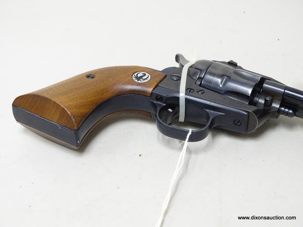 STURM RUGER SINGLE-SIX .22 CALIBER REVOLVER. 4 5/8" BARREL, EXTRA CYLINDER, INSTRUCTIONS AND PARTS