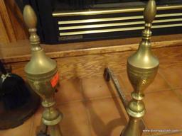 (LR) BRASS FIREPLACE ANDIRONS; FINIAL TOPS, EACH MEASURING 18" TALL AND 17.5 DEEP. 2 TOTAL IN THIS