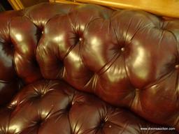 (LR) SMALL LEATHER COUCH; BUTTON-TUFTED CHOCOLATE BROWN LEATHER IS IN EXCELLENT CONDITION. ATTENTION