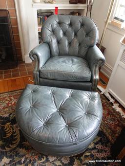 (LR) ONE OF A PAIR OF HANCOCK AND MOORE LEATHER ARM CHAIR WITH MATCHING OTTOMAN-CHAIR- 32"W X 24"L X